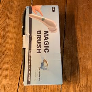 New in box Magic Scrubbing Brush, 5 in 1. Box a bit damaged